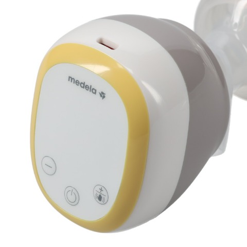 電動さく乳器